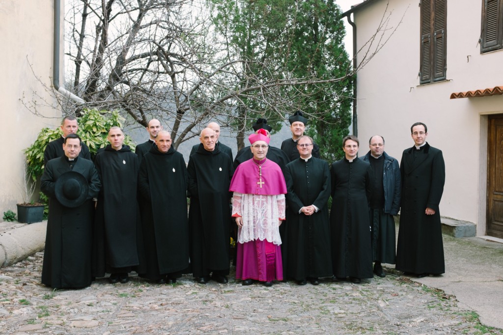 A group of clergy around Bishop Borghetti.